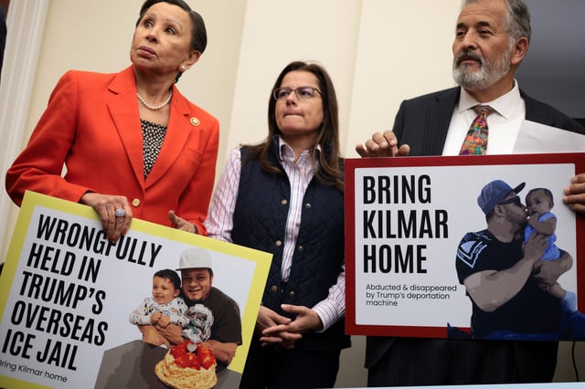 U.S. Rep. Nydia Velazquez (D-NY) (L) and Rep. Juan Vargas (D-CA) (R) hold pictures of Kilmar Abrego Garcia during a news conference to discuss Abrego Garcia’s arrest and deportation at Cannon House Office Building on April 9, 2025 in Washington, DC.