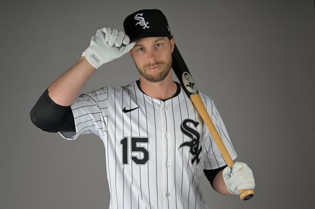 Feb 20, 2025; Glendale, AZ, USA;  Chicago White Sox right fielder Austin Slater (15) poses for a photo on media day at the team’s spring training facility in Glendale, AZ.  Mandatory Credit: Jayne Kamin-Oncea-Imagn Images/File Photo