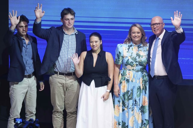 Australian Liberal Party leader Peter Dutton, right, stands with his wife, Kirilly Brumby, and children, Rebecca, Harry and Tom following his party's coalition campaign launch ahead of the May 3 federal election in western Sydney, Australia, Sunday, April 13, 2025. (AP Photo/Mark Baker)