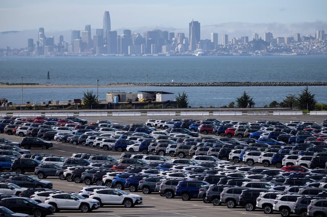 New vehicles are seen at a parking lot in the Port of Richmond, as trade tensions escalate over U.S. tariffs with China, at the bay of San Francisco, California, U.S., April 11, 2025. REUTERS/Carlos Barria/File Photo