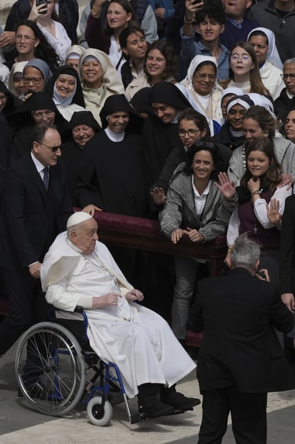 Pope Francis arrives at the end of the mass on Palm Sunday in St. Peter's Square at The Vatican, Sunday, April 13, 2025. (AP Photo/Alessandra Tarantino)