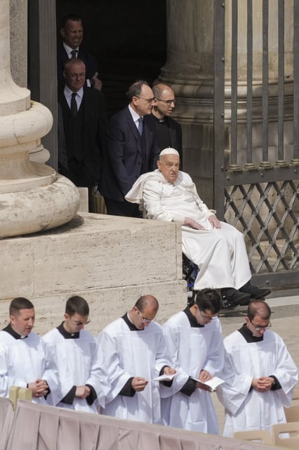 Pope Francis arrives at the end of the mass on Palm Sunday in St. Peter's Square at The Vatican, Sunday, April 13, 2025. (AP Photo/Alessandra Tarantino)