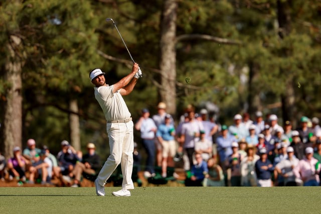 Jason Day takes a shot during the third round of the Masters Tournament at Augusta National Golf Club.