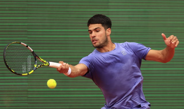 Tennis - ATP Masters 1000 - Monte Carlo Masters - Monte Carlo Country Club, Roquebrune-Cap-Martin, France - April 13, 2025 Spain's Carlos Alcaraz in action during his final match against Italy's Lorenzo Musetti REUTERS/Manon Cruz