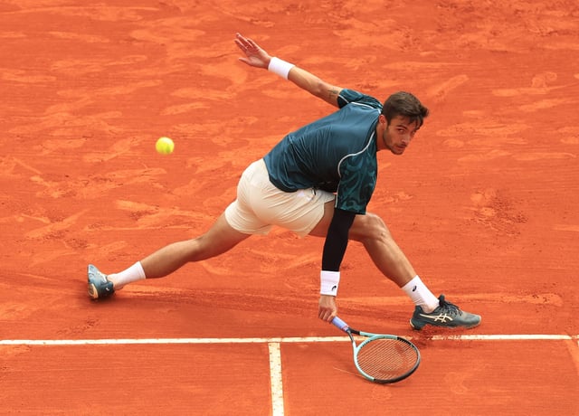 Tennis - ATP Masters 1000 - Monte Carlo Masters - Monte Carlo Country Club, Roquebrune-Cap-Martin, France - April 13, 2025 Italy's Lorenzo Musetti in action during his final match against Spain's Carlos Alcaraz REUTERS/Manon Cruz