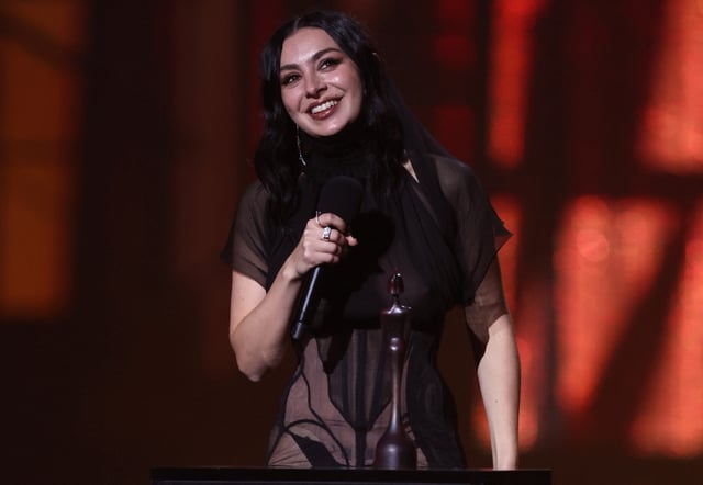 Charli xcx receives the award for Artist Of The Year during the BRIT Awards at the O2 Arena in London, Britain, March 1, 2025. REUTERS/Isabel Infantes/File Photo