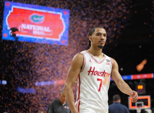 Apr 7, 2025; San Antonio, TX, USA;  Houston Cougars guard Milos Uzan (7) walks off the court after losing to the Florida Gators in the national championship game of the Final Four of the 2025 NCAA Tournament at the Alamodome. Mandatory Credit: Robert Deutsch-Imagn Images/File Photo