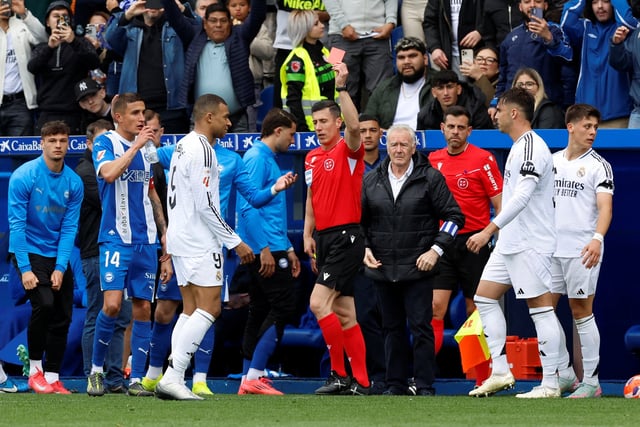 Soccer Football - LaLiga - Deportivo Alaves v Real Madrid - Estadio Mendizorroza, Vitoria-Gasteiz, Spain - April 13, 2025 Real Madrid's Kylian Mbappe is shown a red card by referee Cesar Soto Grado REUTERS/Vincent West