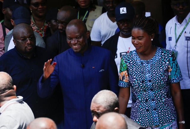 Presidential candidate Brice Clotaire Oligui Nguema is pictured with his wife Zita Oligui Nguema after casting his vote during the presidential election, at a polling station inside a school, in Libreville, Gabon April 12, 2025. REUTERS/Luc Gnago/File Photo