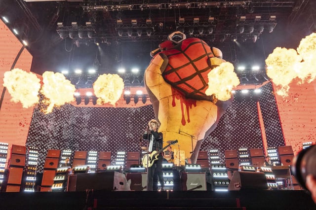 Billie Joe Armstrong performs with Green Day on Saturday, April 12, a set whose pyrotechnics sparked a fire that burned a tree backstage.
 