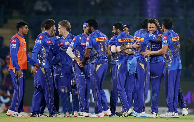 Cricket - Indian Premier League - IPL - Delhi Capitals v Mumbai Indians - Arun Jaitley Stadium, Delhi, India - April 13, 2025 Mumbai Indians players celebrate after the match REUTERS/Anushree Fadnavis