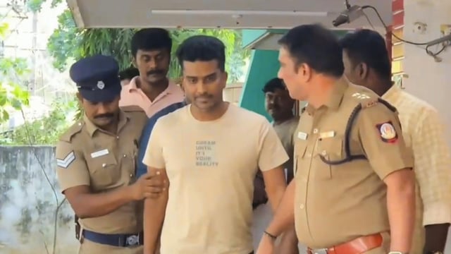 Police personnel arrest a pastor for allegedly sexually abusing two minors, in Coimbatore, Tamil Nadu, on Sunday (PTI)