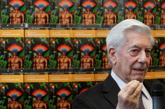 Peruvian writer Mario Vargas Llosa gestures as he answers a journalist's question at the Vienna main library, Austria October 18, 2011.   REUTERS/Herwig Prammer/File Photo