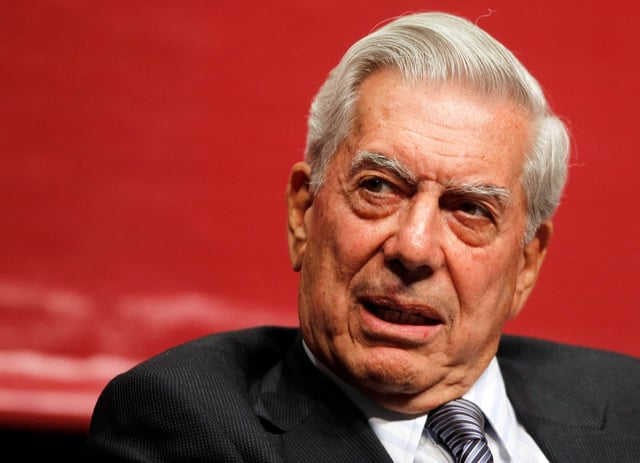 Peruvian-born literature Nobel laureate Mario Vargas Llosa attends a conference with students at the Teatro de la Ciudad in Monterrey, Mexico, March 9, 2011.  REUTERS/Tomas Bravo/File Photo