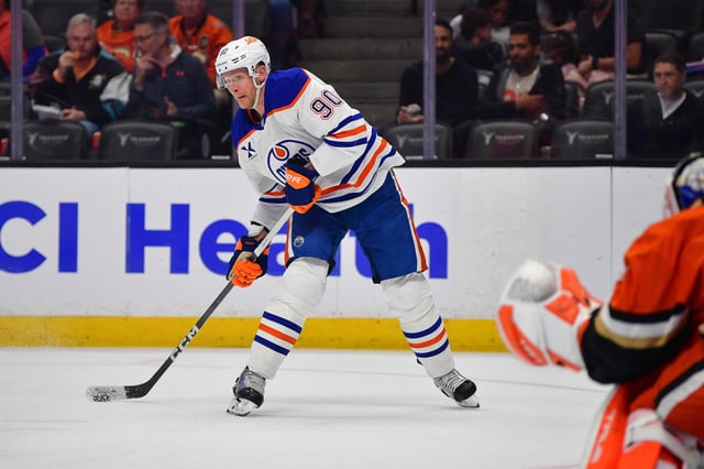 Apr 7, 2025; Anaheim, California, USA; Edmonton Oilers right wing Corey Perry (90) moves in for a shot against the Anaheim Ducks during the first period at Honda Center. Mandatory Credit: Gary A. Vasquez-Imagn Images
