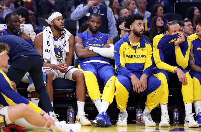Golden State Warriors forward Jonathan Kuminga sits on the bench in the second quarter against the Los Angeles Clippers at Chase Center in San Francisco on Sunday, April 13, 2025.