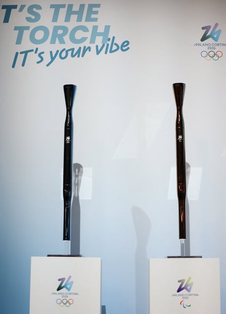 2026 Milano Cortina Winter Olympics - News conference to present Olympic and Paralympic torches - Milan, Italy - April 14, 2025 The 2026 Milano Cortina Winter Olympics and Paralympic torches are seen on display during a ceremony REUTERS/Claudia Greco