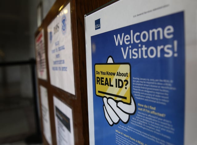 A sign at the federal courthouse in Tacoma, Wash, is shown to inform visitors of the federal government&#39;s REAL ID act.