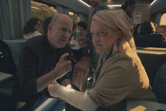 Darrin Baker and Elisabeth Moss in The Handmaid&#39;s Tale Season 6 – “Train” – June and Serena’s journey takes an unexpected turn. Moira makes a bold decision. Nick deals with a powerful visitor.