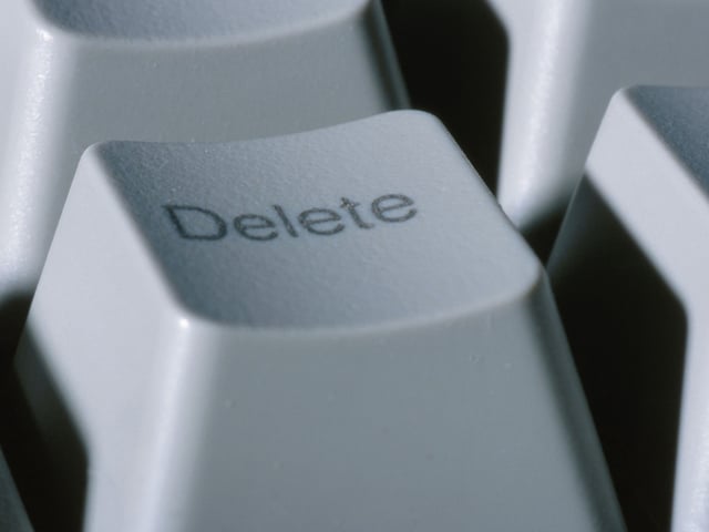A computer keyboard "Delete" key.
