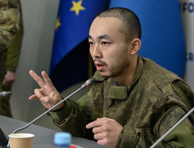 Both Chinese soldiers were speaking under armed guard, with no way of telling whether they talking freely