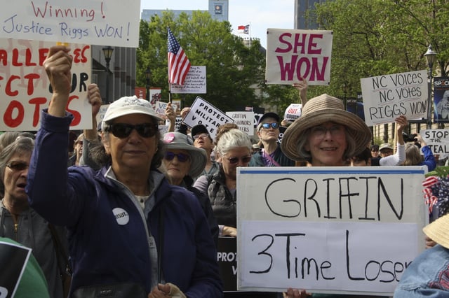 Supporters listen to speeches at Democratic Associate Justice Allison Riggs' rally in Raleigh, N.C., on Monday, April 14, 2025. (AP Photo/Makiya Seminera)
