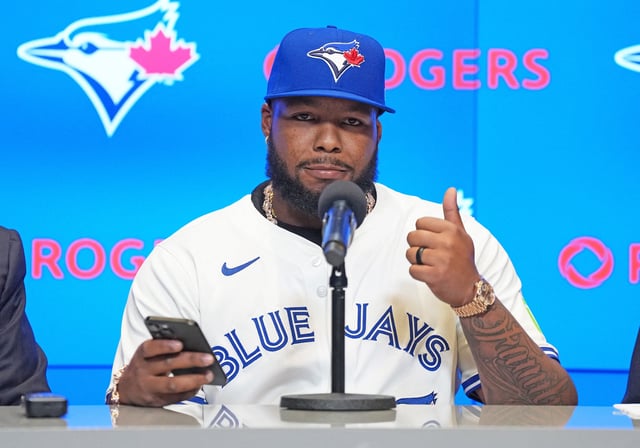 Apr 14, 2025; Toronto, Ontario, Canada; Toronto Blue Jays Vladimir Guerrero Jr. gestures at  the media during the press conference at Rogers Centre. Mandatory Credit: Nick Turchiaro-Imagn Images