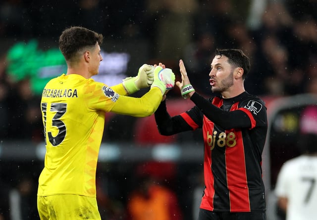 Soccer Football - Premier League - AFC Bournemouth v Fulham - Vitality Stadium, Bournemouth, Britain - April 14, 2025 AFC Bournemouth's Kepa Arrizabalaga and Adam Smith celebrate after the match Action Images via Reuters/John Sibley EDITORIAL USE ONLY. NO USE WITH UNAUTHORIZED AUDIO, VIDEO, DATA, FIXTURE LISTS, CLUB/LEAGUE LOGOS OR 'LIVE' SERVICES. ONLINE IN-MATCH USE LIMITED TO 120 IMAGES, NO VIDEO EMULATION. NO USE IN BETTING, GAMES OR SINGLE CLUB/LEAGUE/PLAYER PUBLICATIONS. PLEASE CONTACT YOUR ACCOUNT REPRESENTATIVE FOR FURTHER DETAILS..