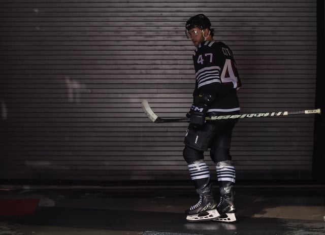 Apr 13, 2025; Newark, New Jersey, USA; New Jersey Devils center Paul Cotter (47) walks to the locker room after being given a game misconduct against the New York Islanders during the second period at Prudential Center. Mandatory Credit: Ed Mulholland-Imagn Images