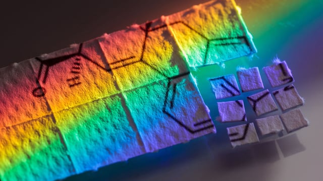 pieces of paper with chemical structures, micro dosing concept