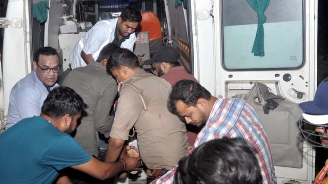 A patient being evacuated after a fire broke out at Lok Bandhu hospital, in Lucknow on Monday, April 14, 2025.