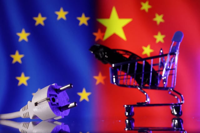 Power plug, shopping cart and miniature car are seen in front of EU and Chinese flags in this illustration taken December 17, 2024. REUTERS/Dado Ruvic/Illustration/File Photo