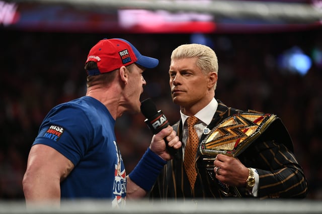 John Cena (left) speaks toward Cody Rhodes during WWE Raw at The O2 Arena on March 31, 2025 in London, England.