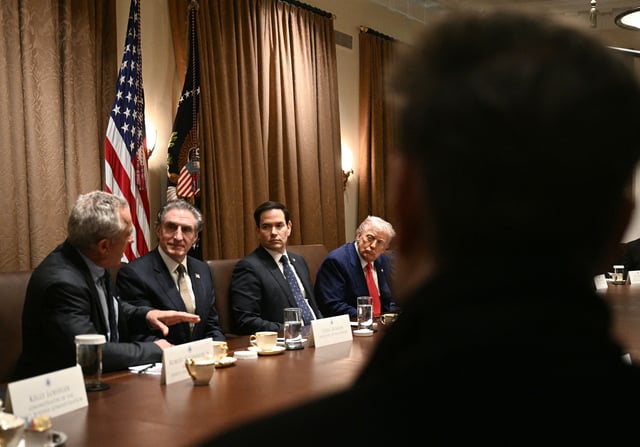 US Secretary of Health and Human Services Robert F. Kennedy Jr., left, speaks during a Cabinet meeting Thursday.