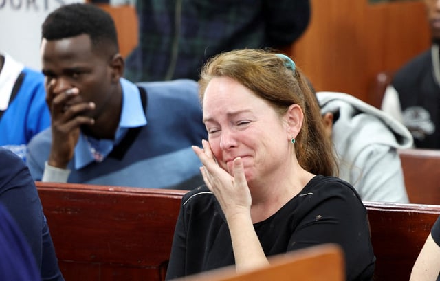 A relative of Belgian national Lornoy David reacts during a hearing in a case where David and another Belgian national Seppe Lodewijckx pleaded guilty to illegal possession and trafficking of garden ants, at the Jomo Kenyatta International Airport (JKIA) Law Courts, in Nairobi, Kenya April 15, 2025. REUTERS/Monicah Mwangi