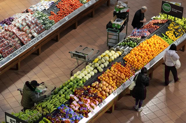 People browse a grocery store following the announcement of tariffs on Canadian and Mexican goods by U.S. President Donald Trump, in Toronto, Ontario, Canada March 4, 2025. REUTERS/Arlyn McAdorey/File Photo