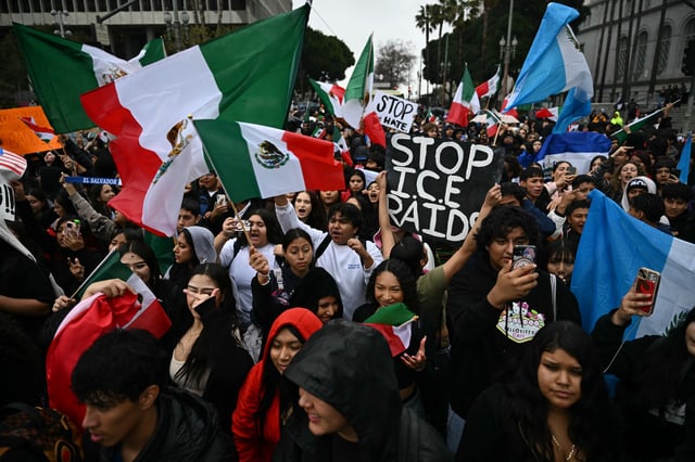 Students gather outside of LA City Hall to protest against US President Donald Trump and for immigration rights in Los Angeles, California on February 5, 2025.