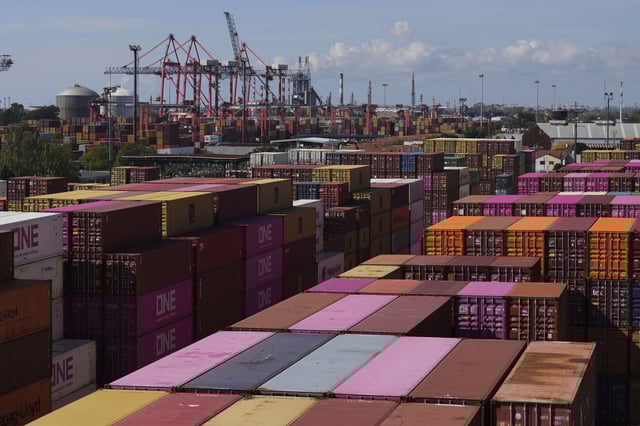 Cargo containers sit at the port in Buenos Aires, Argentina, Monday, April 14, 2025. (AP Photo/Natacha Pisarenko)