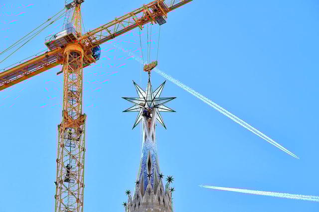 Operators install a giant star atop the Mare de Deu tower (the Virgin Tower) of the Sagrada Família Basilica in 2021.