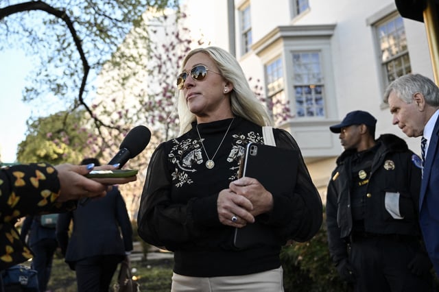 US Representative Marjorie Taylor Greene, Republican from Georgia, speaks to reporters as she arrives for a closed-door meeting with House Republicans, at the Republican National Committee office on Capitol Hill on March 25, 2025, in Washington, DC.