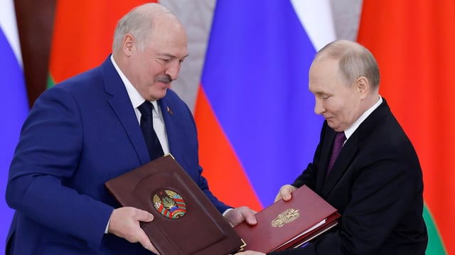 President Putin, right, with his ally Alexander Lukashenko, the Belarusian dictator, in Moscow last month