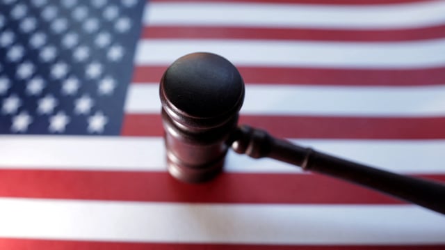 U.S. flag and Judge gavel are seen in this illustration taken, August 6, 2024. REUTERS/Dado Ruvic/Illustration/File Photo