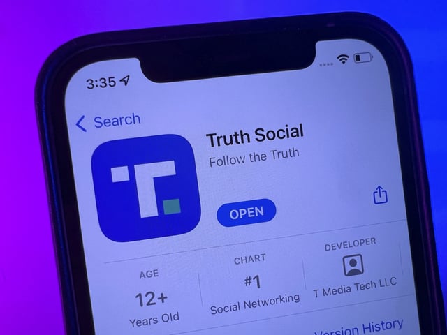 21 February 2022, US, New York: Donald Trump&#39;s social media app &#34;Truth Social&#34; in Apple&#39;s App Store on an iPhone 12.