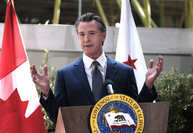 California Governor Gavin Newsom answers questions at a news conference after signing a memorandum of cooperation with Canada&#39;s then-Prime Minister Justin Trudeau on climate change at the California Science Center outside the ninth Summit of the Americas, in Los Angeles, on Thursday, June 9, 2022.