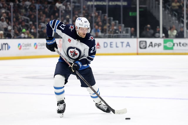 Apr 1, 2025; Los Angeles, California, USA;  Winnipeg Jets left wing Nikolaj Ehlers (27) skates with the puck during the third period against the Los Angeles Kings at Crypto.com Arena. Mandatory Credit: Kiyoshi Mio-Imagn Images/File photo