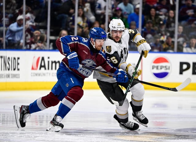 Colorado Eagles forward Gabriel Landeskog (92), left, and Henderson Silver Knights forward Raphael Lavoie (36) battle in the first period at Blue Arena in Loveland, Colorado on Friday, April 11, 2025. (Photo by Andy Cross/The Denver Post)