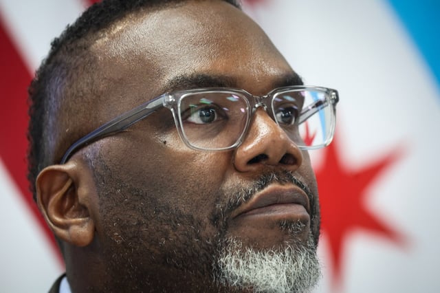 Mayor Brandon Johnson speaks to media at City Hall on April 15, 2025. (Audrey Richardson/Chicago Tribune)