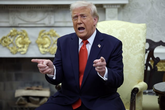 U.S. President Donald Trump gestures as he meets with President Nayib Bukele of El Salvador in the Oval Office of the White House April 14, 2025 in Washington, DC.
