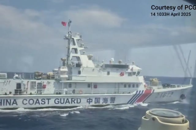Chinese Coast guard cutter the Zhongnan &#34;dangerously blocking&#34; Philippine coast guard ship the BRC Cabra about 40 miles south of contested Scarborough Shoal in the South China Sea.