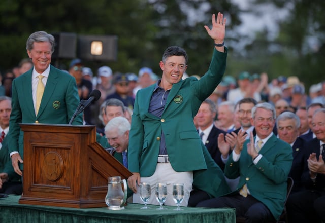 Golf - The Masters - Augusta National Golf Club, Augusta, Georgia, U.S. - April 13, 2025 Northern Ireland's Rory McIlroy celebrates with his green jacket after winning The Masters and completing a career grand slam REUTERS/Mike Blake